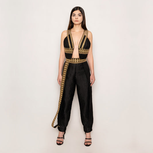 Another front view of the Golden Nomad Set by Tehran in black, highlighting the luxurious jacquard fabric and intricate design details of the vest and pants. The ensemble presents a modern take on timeless tailoring, perfect for the confident, fashion-forward individual.